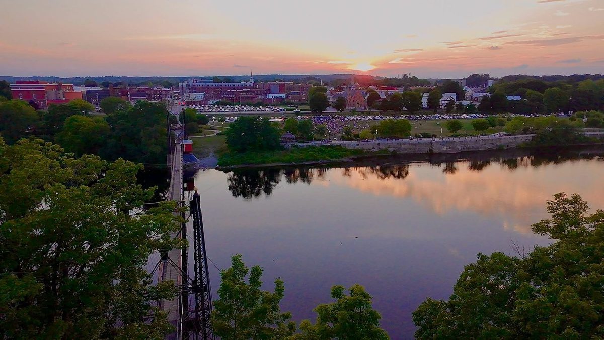 The Two Cent Bridge and downtown Waterville at sunset